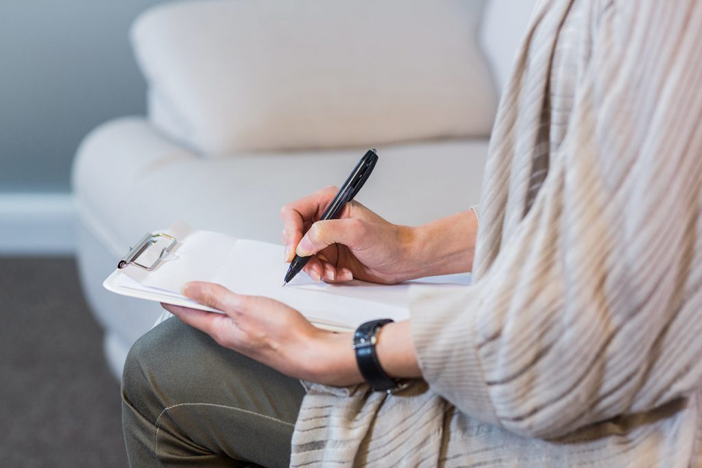 cleaning notes on clipboard